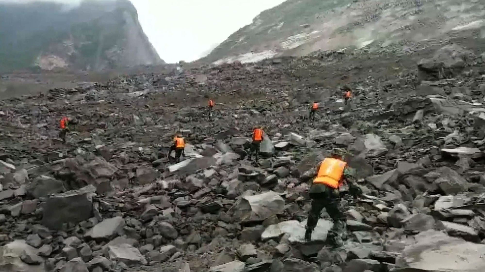 RESCUERS ARE SEARCHING IN CHINA FOR SURVIVORS OF A LANDSLIDE