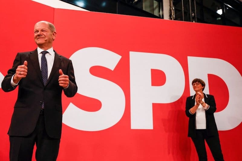 Social Democrats narrowly beat Angela Merkel’s alliance