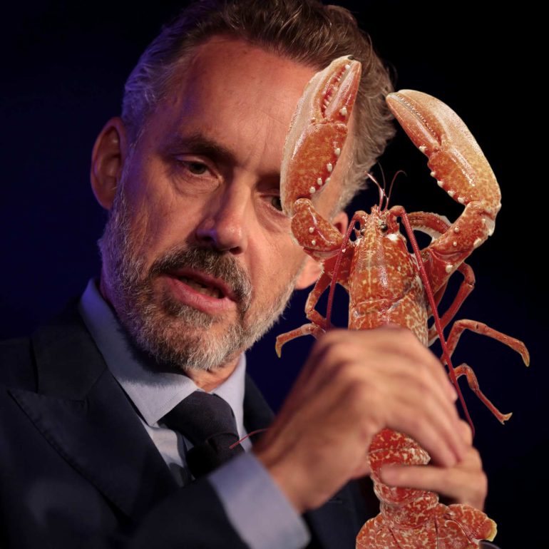 Dr. Jordan Peterson Holding a Lobster Continues to Reject Labeling his faith.
