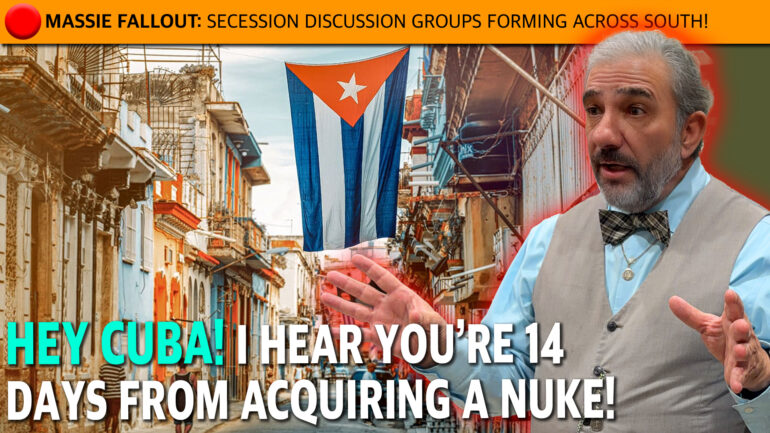 Cuban street scene with a large Cuban flag hanging between buildings; a man in a vest gestures toward the viewer beneath an orange banner.